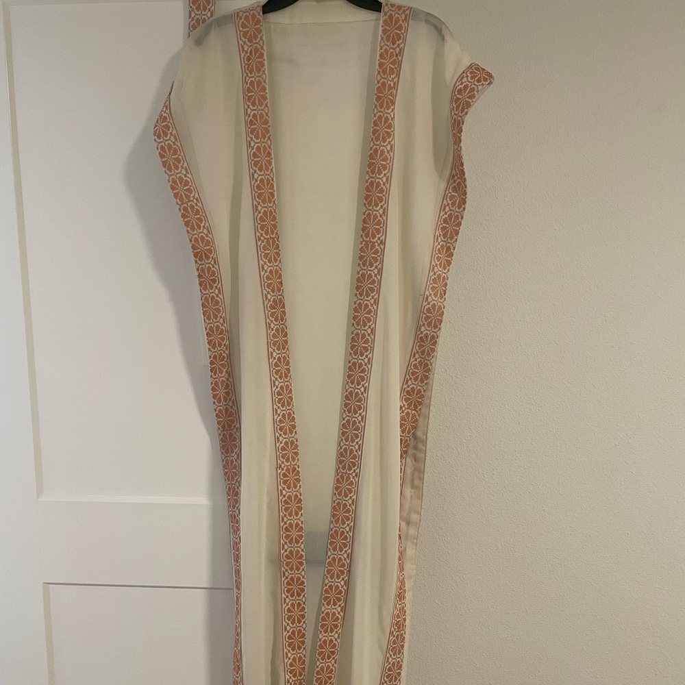Hand stitched cardigan with belt